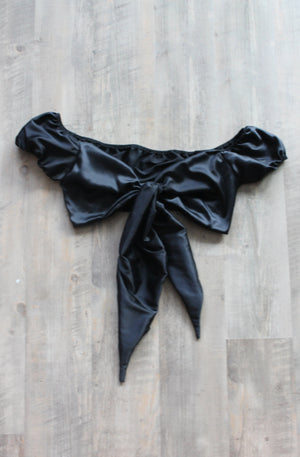 Black silky satin crop top with adjustable tie detail.